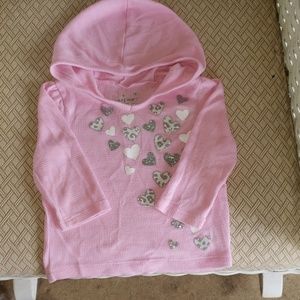 Long sleeve shirt with hood.